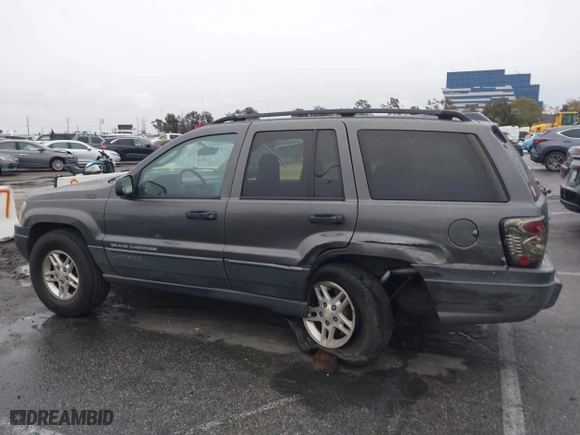 2004 Jeep Grand Cherokee Laredo with VIN 1J4GX48S14C177923, listed as a IAAI auction lot 41745772 with 242,506 mi miles. Bid and sale history available at carsss.com. Image 14.
