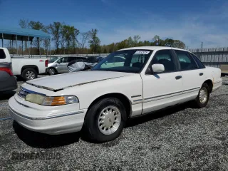 1995 Ford Crown Victoria LX с VIN 2FALP74W0SX150345, выставлен на аукционе Copart как лот 51432975 с пробегом 130 372 миль миль и Списание • Salvage title. История ставок и продаж доступна на DreamBid. Изображение 1.
