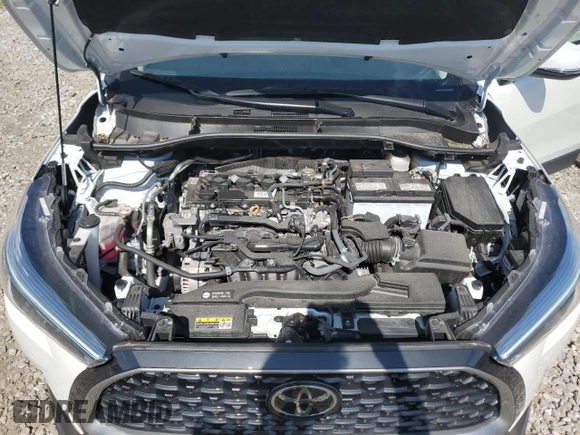 2023 Toyota Corolla Cross XLE with VIN 7MUDAAAG5PV068355, listed as a Copart auction lot 58121795 with 25,667 mi miles and Salvage title. Bid and sale history available at DreamBid. Image 12.