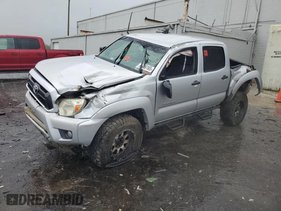 2013 Toyota Tacoma with VIN 5TFLU4EN8DX065656, listed as a Copart auction lot 63486165 with 185,018 mi miles and Salvage title. Bid and sale history available at DreamBid. Image 1.