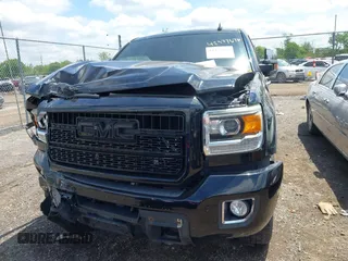 2015 GMC Sierra 2500HD Denali with VIN 1GT120E82FF574358, listed as a IAAI auction lot 42377676 with 86,097 mi miles and . Bid and sale history available at DreamBid. Image 12.