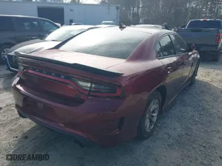 2021 Dodge Charger Scat Pack with VIN 2C3CDXGJXMH666975, listed as a IAAI auction lot 41649739 with 53,428 mi miles. Bid and sale history available at carsss.com. Image 4.
