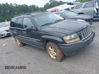 2004 Jeep Grand Cherokee Laredo z VIN 1J4GW48S54C185574, wystawiony jako IAAI lot #42371493 z przebiegiem 227 697 mil mil oraz . Historia ofert i sprzedaży dostępna na DreamBid. Obrazek 1.
