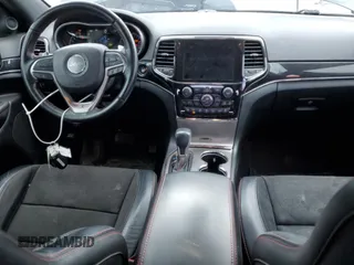 2021 Jeep Grand Cherokee Trailhawk with VIN 1C4RJFLG7MC599693, listed as a Copart auction lot 52863525 with 95,289 mi miles and Salvage Title. Bid and sale history available at carsss.com. Image 8.