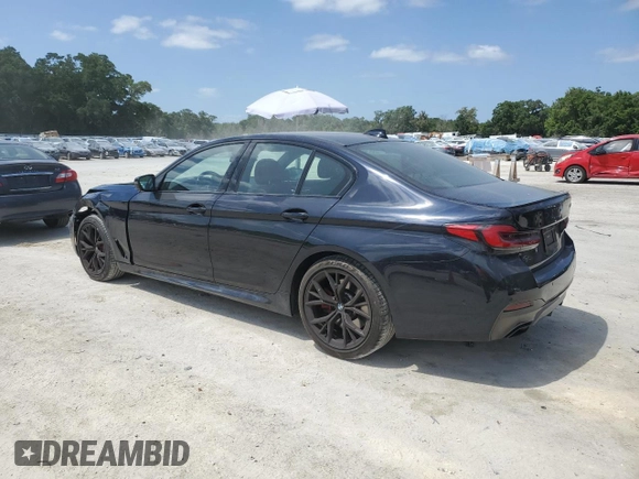 2023 BMW 5 Series 530i with VIN WBA53BH04PWY02486, listed as a Copart auction lot 54519385 with 26,979 mi miles and Salvage title. Bid and sale history available at DreamBid. Image 2.