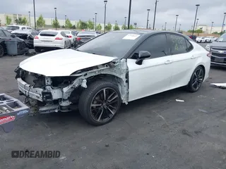 2020 Toyota Camry XSE with VIN 4T1K61AK3LU368467, listed as a IAAI auction lot 42168601 with 78,907 mi miles and . Bid and sale history available at DreamBid. Image 2.