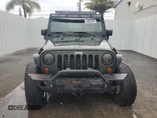 2012 Jeep Wrangler Unlimited Sport with VIN 1C4HJWDG8CL122067, listed as a Copart auction lot 58549805 with 124,658 mi miles and Clean title. Bid and sale history available at DreamBid. Image 5.