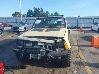 1995 Jeep Cherokee Sport with VIN 1J4FJ68S3SL555908, listed as a IAAI auction lot 42222016 with 283,444 mi miles and . Bid and sale history available at DreamBid. Image 6.
