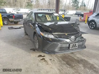 2020 Toyota Camry LE with VIN 4T1C11AKXLU363530, listed as a IAAI auction lot 41670307 with 86,459 mi miles. Bid and sale history available at carsss.com. Image 1.