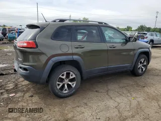 2015 Jeep Cherokee Trailhawk with VIN 1C4PJMBSXFW545534, listed as a Copart auction lot 62236885 with 148,448 mi miles and Clean title. Bid and sale history available at DreamBid. Image 3.