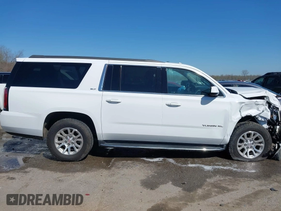 2019 GMC Yukon XL SLT with VIN 1GKS1GKC0KR330715, listed as a IAAI auction lot 41758626 with 134,641 mi miles. Bid and sale history available at carsss.com. Image 13.