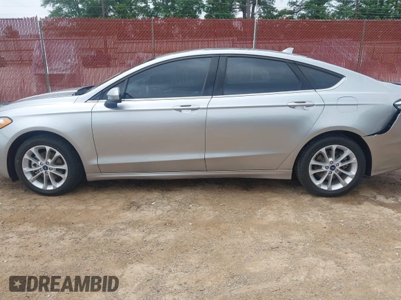 2020 Ford Fusion SE z VIN 3FA6P0LU4LR148070, wystawiony jako IAAI lot #42262446 z przebiegiem 69 057 mil mil oraz . Historia ofert i sprzedaży dostępna na DreamBid. Obrazek 14.