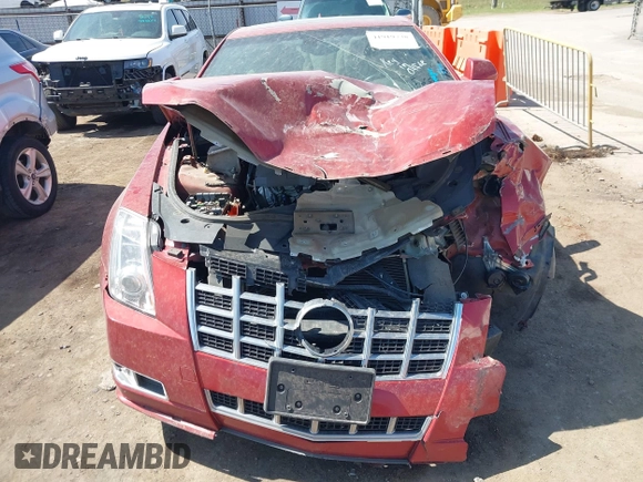 2014 Cadillac CTS Premium with VIN 1G6DD1E31E0120172, listed as a IAAI auction lot 41919738 with 104,744 mi miles and . Bid and sale history available at DreamBid. Image 12.