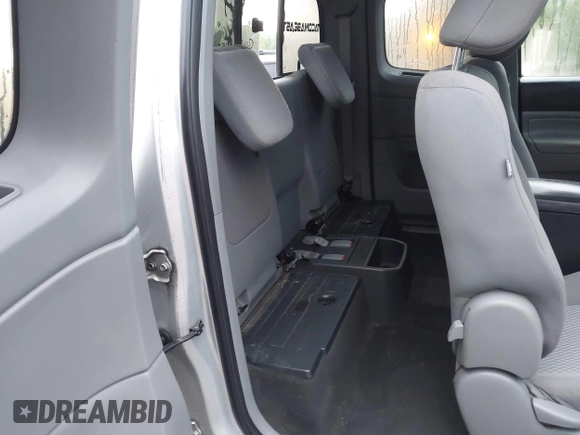 2012 Toyota Tacoma with VIN 5TFUX4EN2CX011263, listed as a IAAI auction lot 42670078 with 164,922 mi miles and . Bid and sale history available at DreamBid. Image 8.