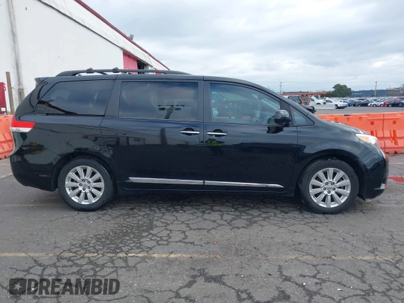 2011 Toyota Sienna XLE AAS with VIN 5TDYK3DC5BS141021, listed as a IAAI auction lot 41538641 with 127,805 mi miles and . Bid and sale history available at DreamBid. Image 13.