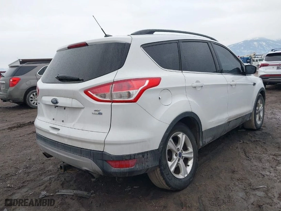 2015 Ford Escape SE with VIN 1FMCU9GX8FUC80918, listed as a IAAI auction lot 41694880 with 182,929 mi miles. Bid and sale history available at carsss.com. Image 6.