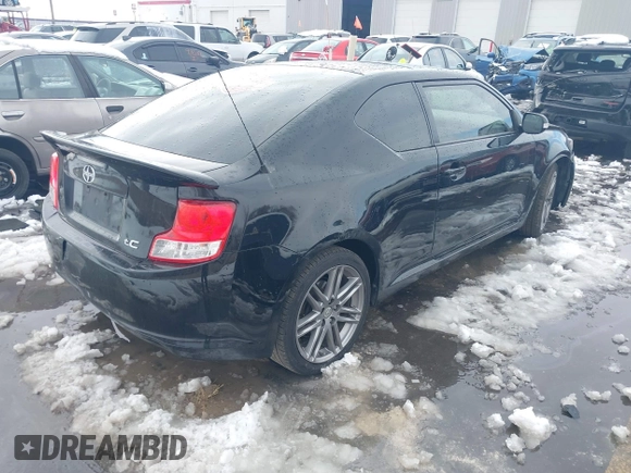 2013 Scion tC with VIN JTKJF5C72D3055801, listed as a IAAI auction lot 41102753 with 242,146 mi miles. Bid and sale history available at carsss.com. Image 4.