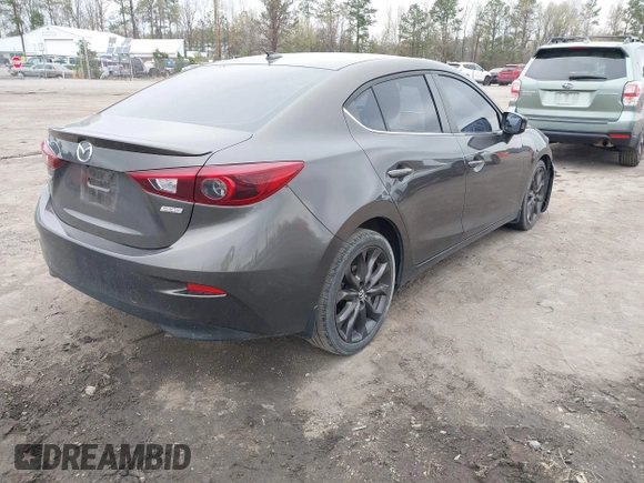 2014 Mazda 3 S Grand Touring with VIN JM1BM1W39E1145186, listed as a IAAI auction lot 41948404 with 111,702 mi miles and . Bid and sale history available at DreamBid. Image 4.