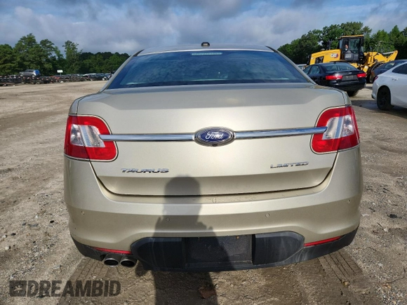 2010 Ford Taurus Limited with VIN 1FAHP2FW7AG138753, listed as a Copart auction lot 64880025 with 242,728 mi miles and Clean title. Bid and sale history available at DreamBid. Image 6.