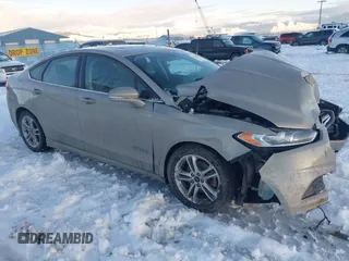 2016 Ford Fusion SE Hybrid with VIN 3FA6P0LU8GR127311, listed as a IAAI auction lot 41242945 with 1 mi miles. Bid and sale history available at carsss.com. Image 1.