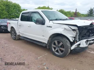 2015 Ford F-150 XLT z VIN 1FTEW1EG7FKE07911, wystawiony jako IAAI lot #42333386 z przebiegiem 138 700 mil mil oraz . Historia ofert i sprzedaży dostępna na DreamBid. Obrazek 1.