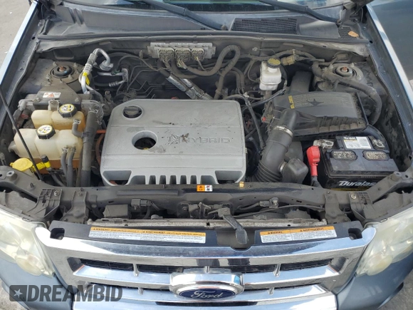 2010 Ford Escape Hybrid with VIN 1FMCU4K30AKC51022, listed as a Copart auction lot 51014615 with 128,275 mi miles and Salvage title. Bid and sale history available at DreamBid. Image 14.