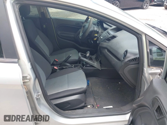 2018 Ford Fiesta S with VIN 3FADP4AJ1JM132300, listed as a IAAI auction lot 42677197 with 37,179 mi miles and . Bid and sale history available at DreamBid. Image 5.