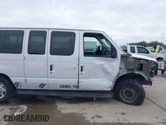 2011 Ford Econoline Passenger XL with VIN 1FBNE3BL2BDB02920, listed as a IAAI auction lot 41621713 with 270,140 mi miles. Bid and sale history available at carsss.com. Image 14.