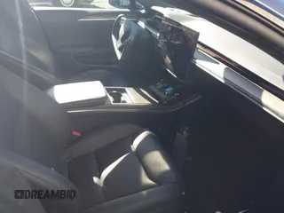 2021 Tesla Model S Long Range with VIN 5YJSA1E52MF428370, listed as a IAAI auction lot 41809773 with 34,372 mi miles and . Bid and sale history available at DreamBid. Image 5.