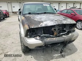 2003 GMC Sonoma SLS z VIN 1GTCT19X938201721, wystawiony jako Copart lot #56011695 z przebiegiem Nie podano mil oraz Nie do naprawy. Historia ofert i sprzedaży dostępna na DreamBid. Obrazek 14.