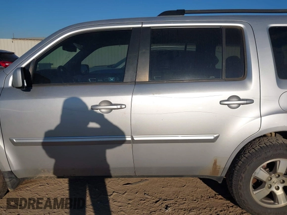 2011 Honda Pilot EX-L with VIN 5FNYF3H68BB020464, listed as a IAAI auction lot 41259261 with 223,069 mi miles and . Bid and sale history available at DreamBid. Image 14.