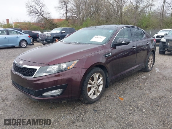 2013 Kia Optima EX with VIN 5XXGN4A74DG111397, listed as a IAAI auction lot 41977063 with 113,571 mi miles. Bid and sale history available at carsss.com. Image 2.