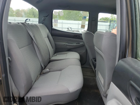 2012 Toyota Tacoma z VIN 3TMLU4ENXCM103392, wystawiony jako Copart lot #57296535 z przebiegiem 80 217 mil mil oraz Czysty tytuł • Clean title. Historia ofert i sprzedaży dostępna na DreamBid. Obrazek 10.