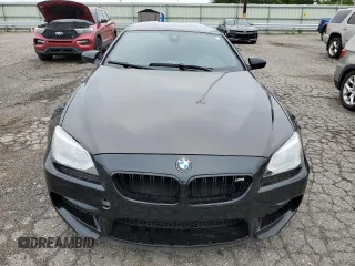 2015 BMW M6 z VIN WBS6C9C59FD467652, wystawiony jako Copart lot #66093293 z przebiegiem Nie podano mil oraz . Historia ofert i sprzedaży dostępna na DreamBid. Obrazek 5.