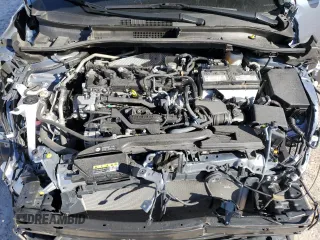 2023 Toyota Corolla Cross LE with VIN 7MUCAAAG8PV060228, listed as a Copart auction lot 86827224 with 40,395 mi miles and Salvage title. Bid and sale history available at DreamBid. Image 12.