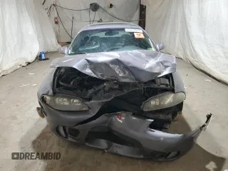 1998 Mitsubishi Eclipse with VIN 4A3AK44Y1WE117391, listed as a Copart auction lot 75937014 with 202,560 mi miles and Salvage Title. Bid and sale history available at DreamBid. Image 5.