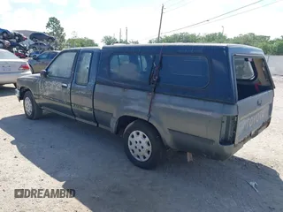 1993 Toyota Pickup DLX z VIN JT4RN93P3P5069851, wystawiony jako IAAI lot #41950116 z przebiegiem 209 937 mil mil oraz . Historia ofert i sprzedaży dostępna na DreamBid. Obrazek 3.