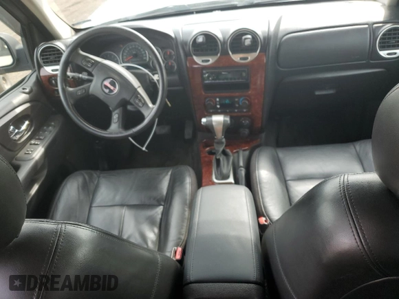 2007 GMC Envoy SLT with VIN 1GKDT13S272265100, listed as a Copart auction lot 73136264 with 245,198 mi miles and Salvage Title. Bid and sale history available at carsss.com. Image 8.
