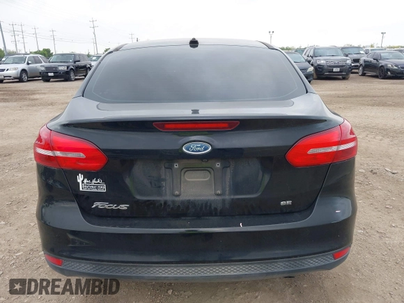2018 Ford Focus SE with VIN 1FADP3F28JL302634, listed as a IAAI auction lot 42103219 with 71,682 mi miles and . Bid and sale history available at DreamBid. Image 17.