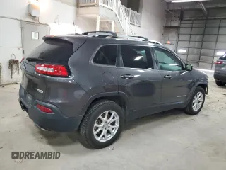 2015 Jeep Cherokee Latitude with VIN 1C4PJMCS0FW787988, listed as a Copart auction lot 52105155 with 117,254 mi miles and Salvage Title. Bid and sale history available at DreamBid. Image 3.