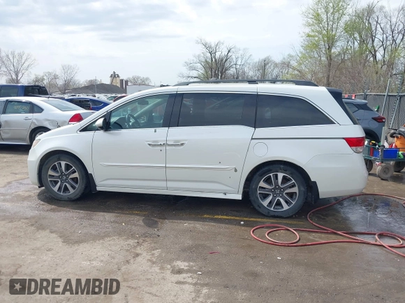 2014 Honda Odyssey Touring с VIN 5FNRL5H94EB057681, выставлен на аукционе IAAI как лот 41828000 с пробегом 249 350 миль миль и . История ставок и продаж доступна на DreamBid. Изображение 15.