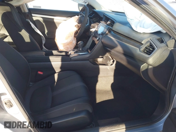 2020 Honda Civic LX with VIN 19XFC2F63LE004953, listed as a IAAI auction lot 41824922 with 71,458 mi miles and . Bid and sale history available at DreamBid. Image 5.