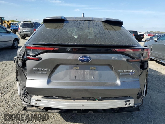 2024 Subaru Solterra Limited с VIN JTMABABA8RA049528, выставлен на аукционе Copart как лот 50563845 с пробегом 13 114 миль миль и Списание • Salvage title. История ставок и продаж доступна на DreamBid. Изображение 6.
