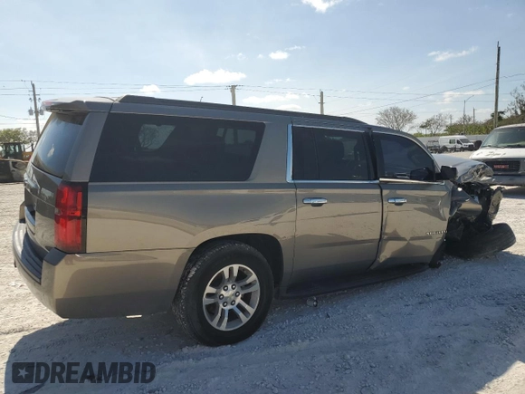 2018 Chevrolet Suburban LS z VIN 1GNSCGKC6JR249746, wystawiony jako Copart lot #55622105 z przebiegiem 126 378 mil mil oraz Szkoda całkowita • Salvage title. Historia ofert i sprzedaży dostępna na DreamBid. Obrazek 3.