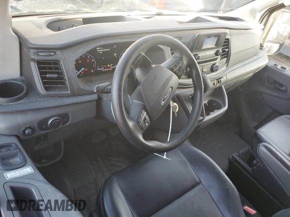 2021 Ford Transit Cargo with VIN 1FTBR1X87MKA68791, listed as a Copart auction lot 43239345 with 95,963 mi miles and Salvage Title. Bid and sale history available at DreamBid. Image 8.
