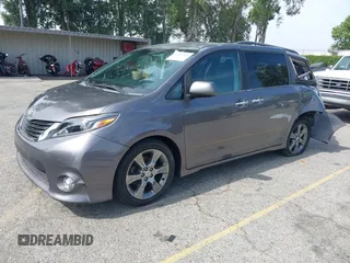 2015 Toyota Sienna SE with VIN 5TDXK3DCXFS680767, listed as a IAAI auction lot 42237107 with 105,912 mi miles and . Bid and sale history available at DreamBid. Image 18.