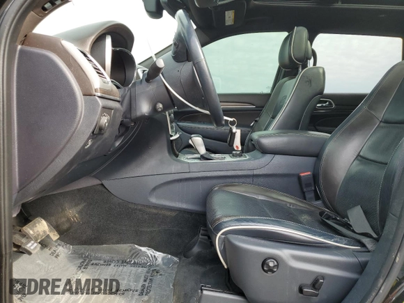 2016 Jeep Grand Cherokee Overland with VIN 1C4RJFCG8GC402339, listed as a Copart auction lot 47553385 with 121,486 mi miles and Salvage title. Bid and sale history available at DreamBid. Image 7.