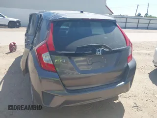 2016 Honda Fit LX z VIN JHMGK5H56GX041075, wystawiony jako IAAI lot #42023299 z przebiegiem 145 658 mil mil oraz . Historia ofert i sprzedaży dostępna na DreamBid. Obrazek 16.