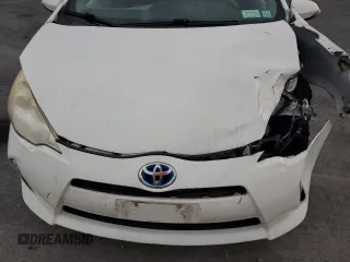 2012 Toyota Prius One z VIN JTDKDTB3XC1509615, wystawiony jako Copart lot #59868725 z przebiegiem Nie podano mil oraz Szkoda całkowita • Salvage title. Historia ofert i sprzedaży dostępna na DreamBid. Obrazek 11.