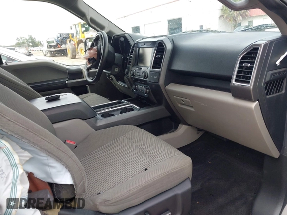 2015 Ford F-150 XLT with VIN 1FTEW1EG5FFA99713, listed as a IAAI auction lot 42481854 with 165,415 mi miles and . Bid and sale history available at DreamBid. Image 5.
